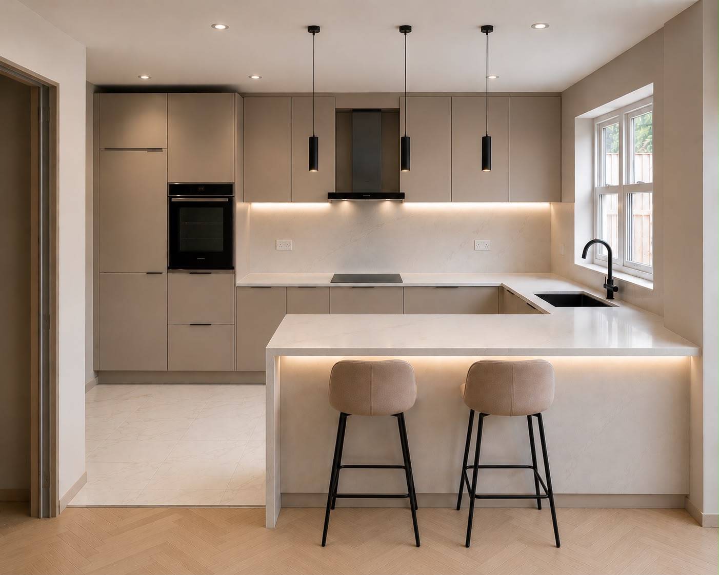 Modern fitted kitchen with island and pendant lighting